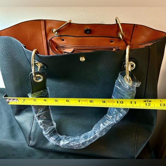 New, large black tote bag, with brown lining. Faux leather. - Picture 6 of 7